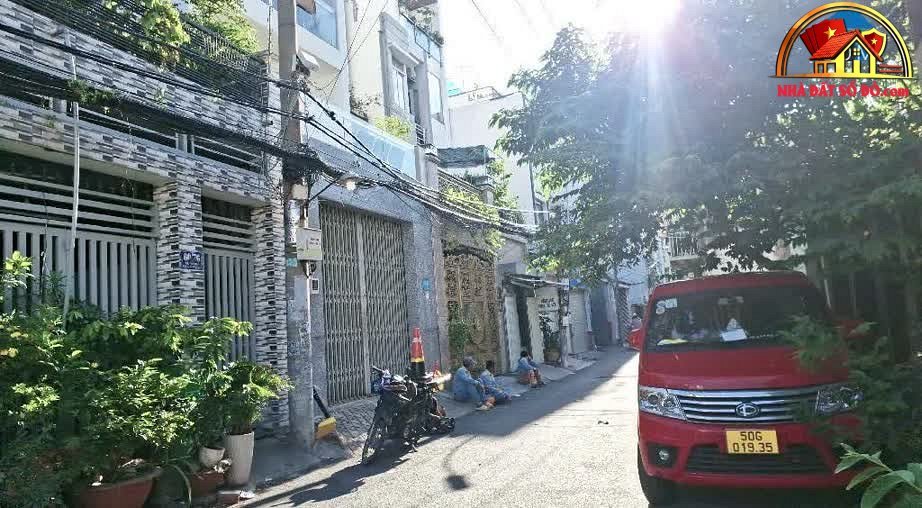 Nhà riêng 100m² HXH Quận 7 – Giá 7.9 tỷ – Tiện xây mới tự do – Bán nhà đất sổ đỏ