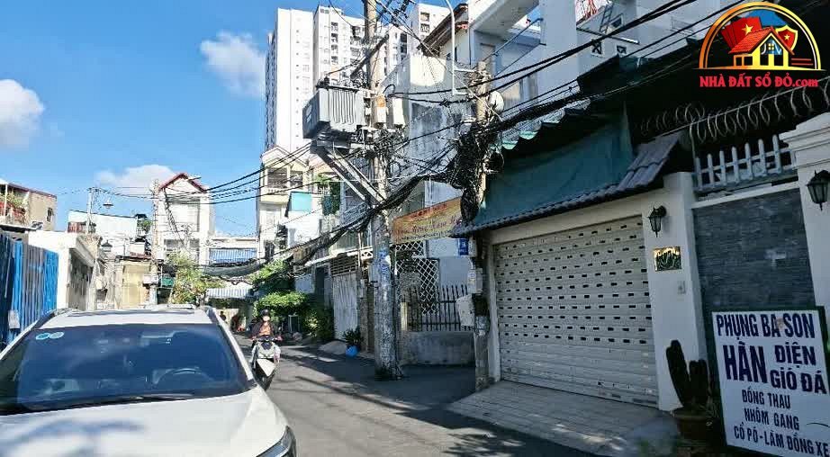 Nhà riêng 100m² HXH Quận 7 – Giá 7.9 tỷ – Tiện xây mới tự do – Bán nhà đất sổ đỏ