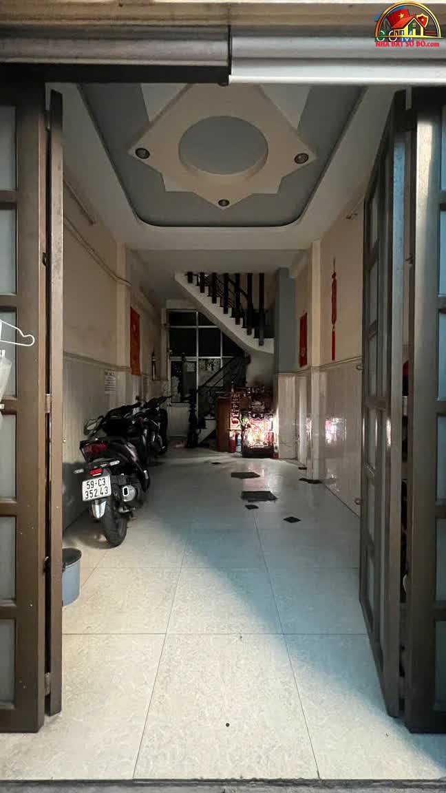Nhà đất sổ đỏ Quận 4 TP.HCM 4 lầu kinh doanh phòng trọ giá 9 tỷ