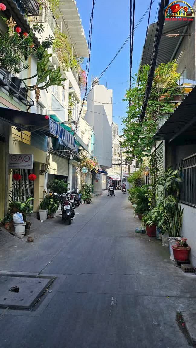 Nhà đất sổ đỏ Quận 4 TP.HCM Mặt Tiền Kinh Doanh Ngay Chợ