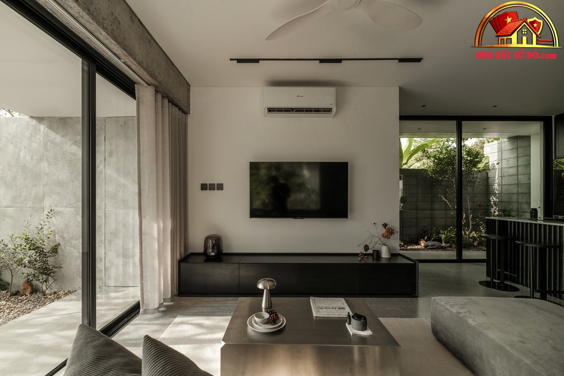 Nhà hướng Tây 102m² tại Huế: Lõi cầu thang mặt tiền và vật liệu bản địa làm mát tự nhiên- Ảnh 10.