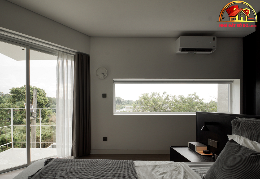 Nhà hướng Tây 102m² tại Huế: Lõi cầu thang mặt tiền và vật liệu bản địa làm mát tự nhiên- Ảnh 17.
