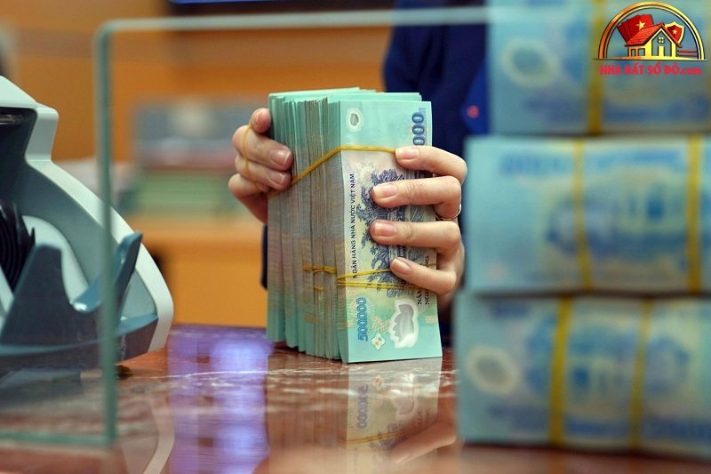 Tiền người dân gửi ngân hàng lập kỷ lục, vượt 11,2 triệu tỷ đồng- Ảnh 1. Tiền người dân gửi ngân hàng lập kỷ lục, vượt 11,2 triệu tỷ đồng- Ảnh 1.